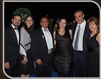 No Jantar de Gala: Drs. Márcio e Manoela Crisóstomo, Bob Leonard, Marcelo Pitchon e esposas.